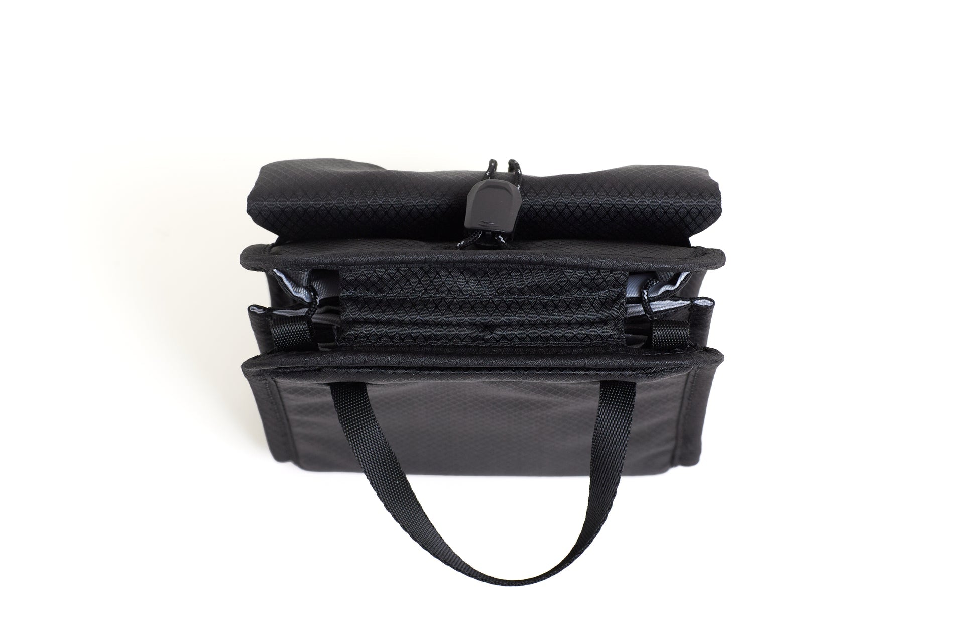 NIID EDC Compact Travel Pouch Black Top View showing a handle on a white background
